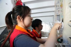 国网佳木斯供电公司：治理城市“牛皮癣” 美化环境“靓”社区